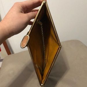 Etra brown leather clutch